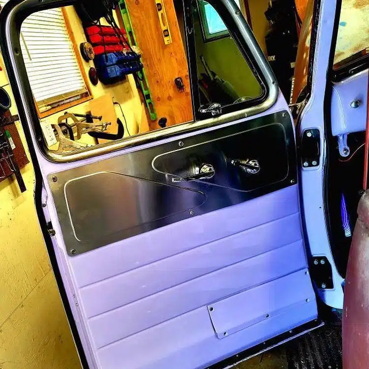 Bead rolled aluminum door panels installed and painted on Chevy truck