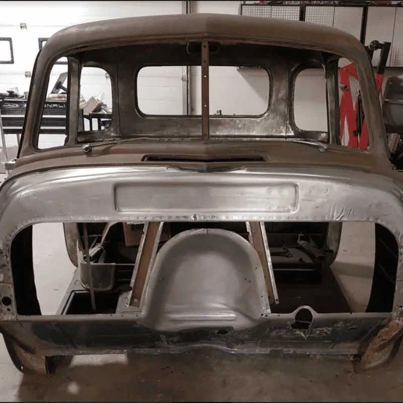 Factory firewall cutout prepared for a 47-54 Chevy truck bead rolled panel
