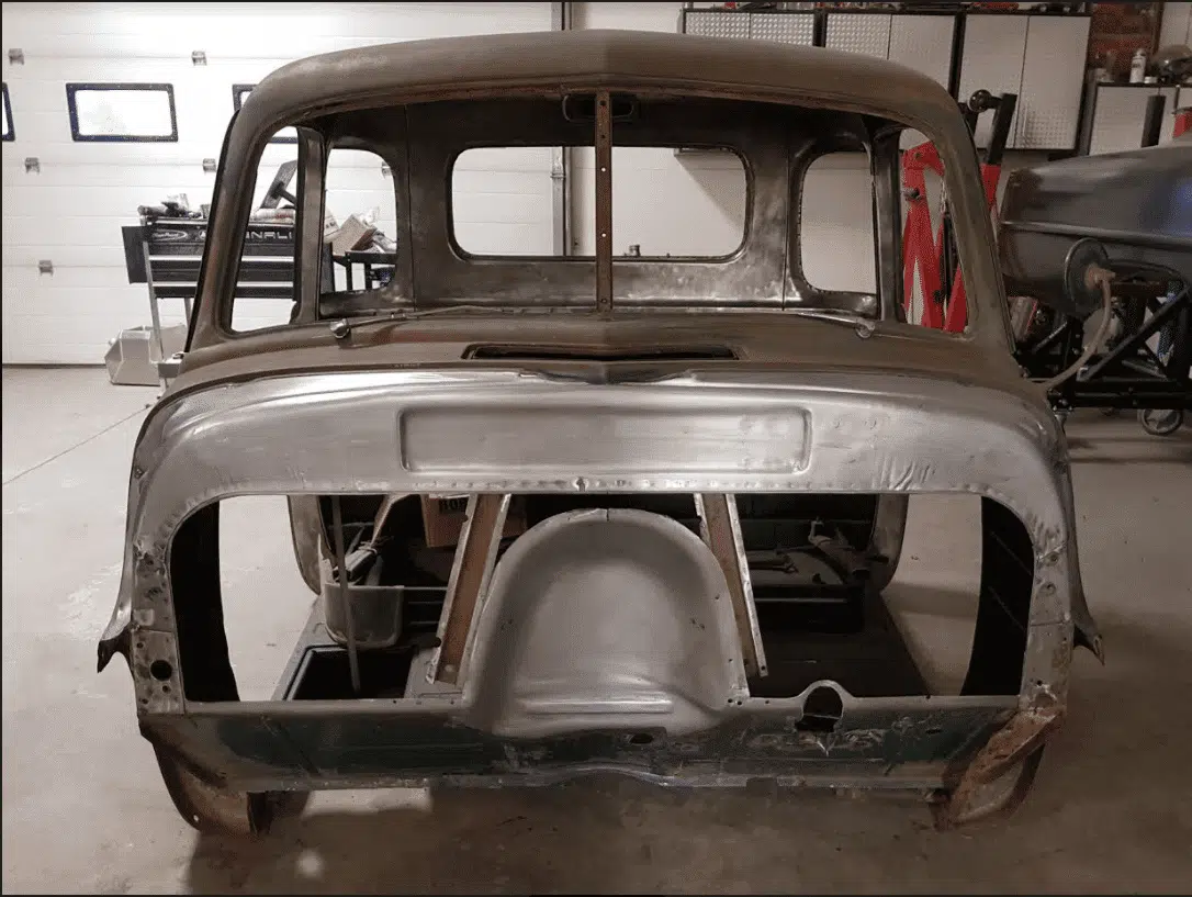 Factory firewall cutout prepared for a 47-54 Chevy truck bead rolled panel