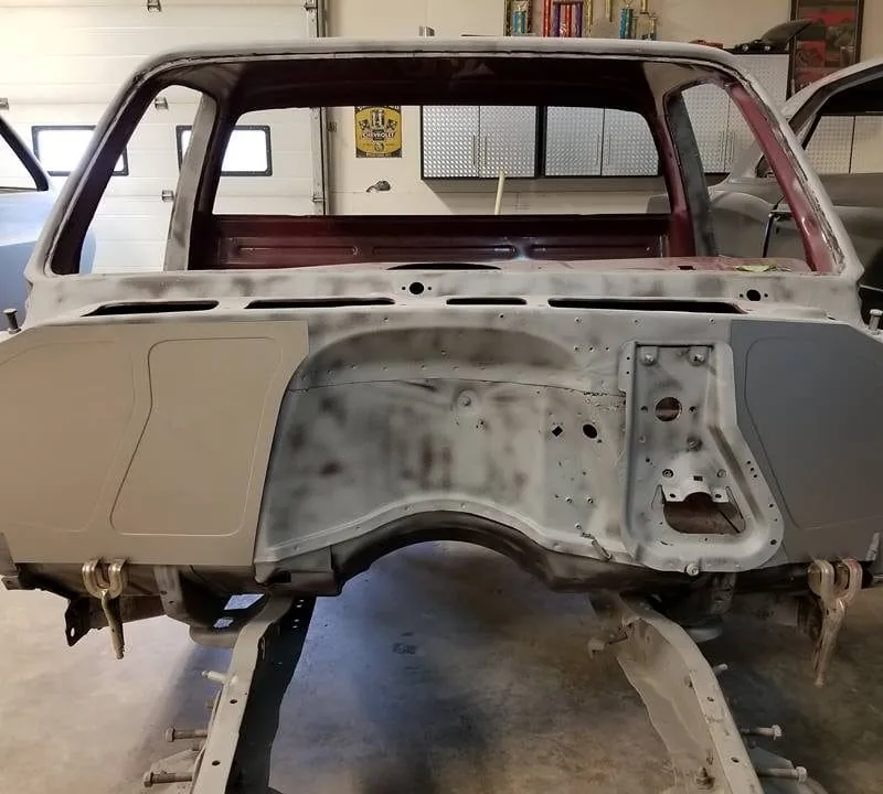 Squarebody C10 firewall panel in the engine bay of a 73-87 Chevy truck
