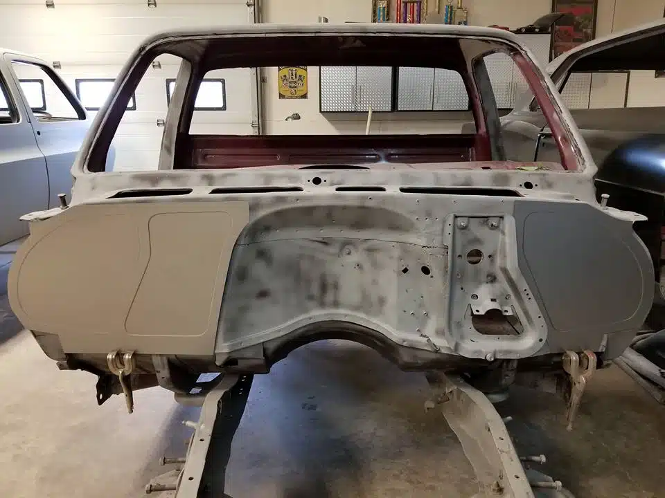 Squarebody C10 firewall panel in the engine bay of a 73-87 Chevy truck