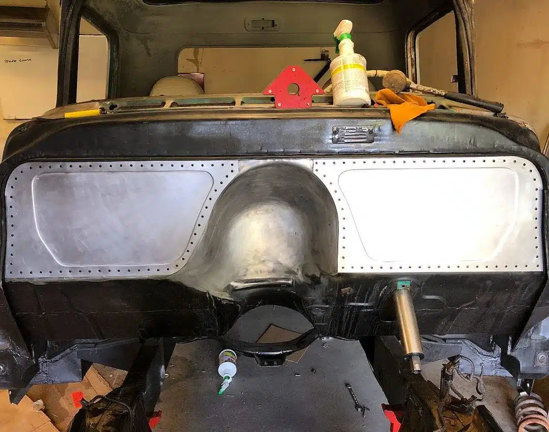 Bead rolled firewall riveted into a 55-59 Chevy truck