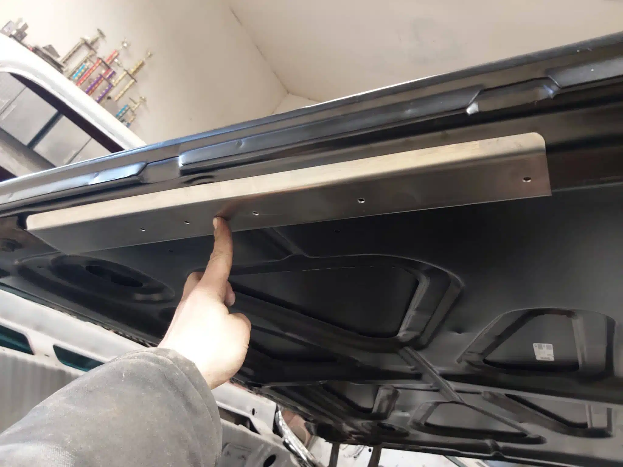 Square body truck upgrades: hood braces on a 1973-80 Chevy C10