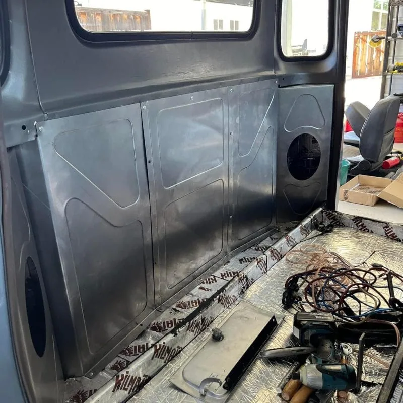 Bead rolled behind the seat panels and speaker brackets, alternate angle
