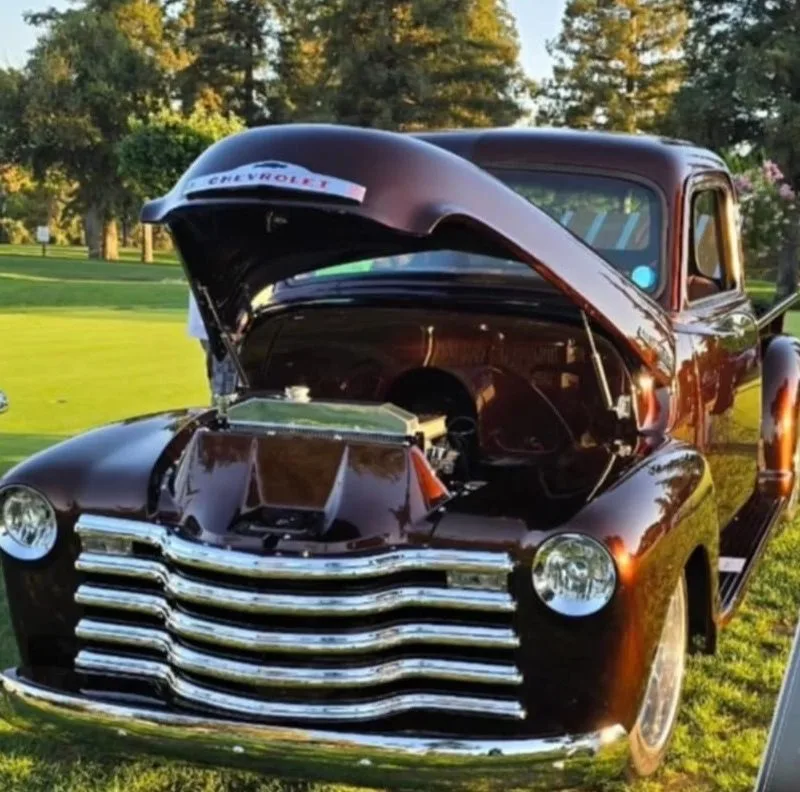 Hood strut for 47-54 GMC Chevy truck, close-up detail