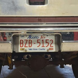 Raised License plate bracket installed 2 1967-1987 chevy gm truck