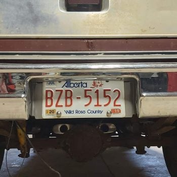 Raised License plate bracket installed 2 1967-1987 chevy gm truck