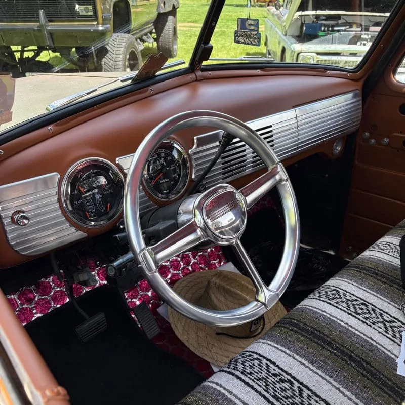 Billet steering wheel and billet dash in a 1947-54 GMC Chevy truck