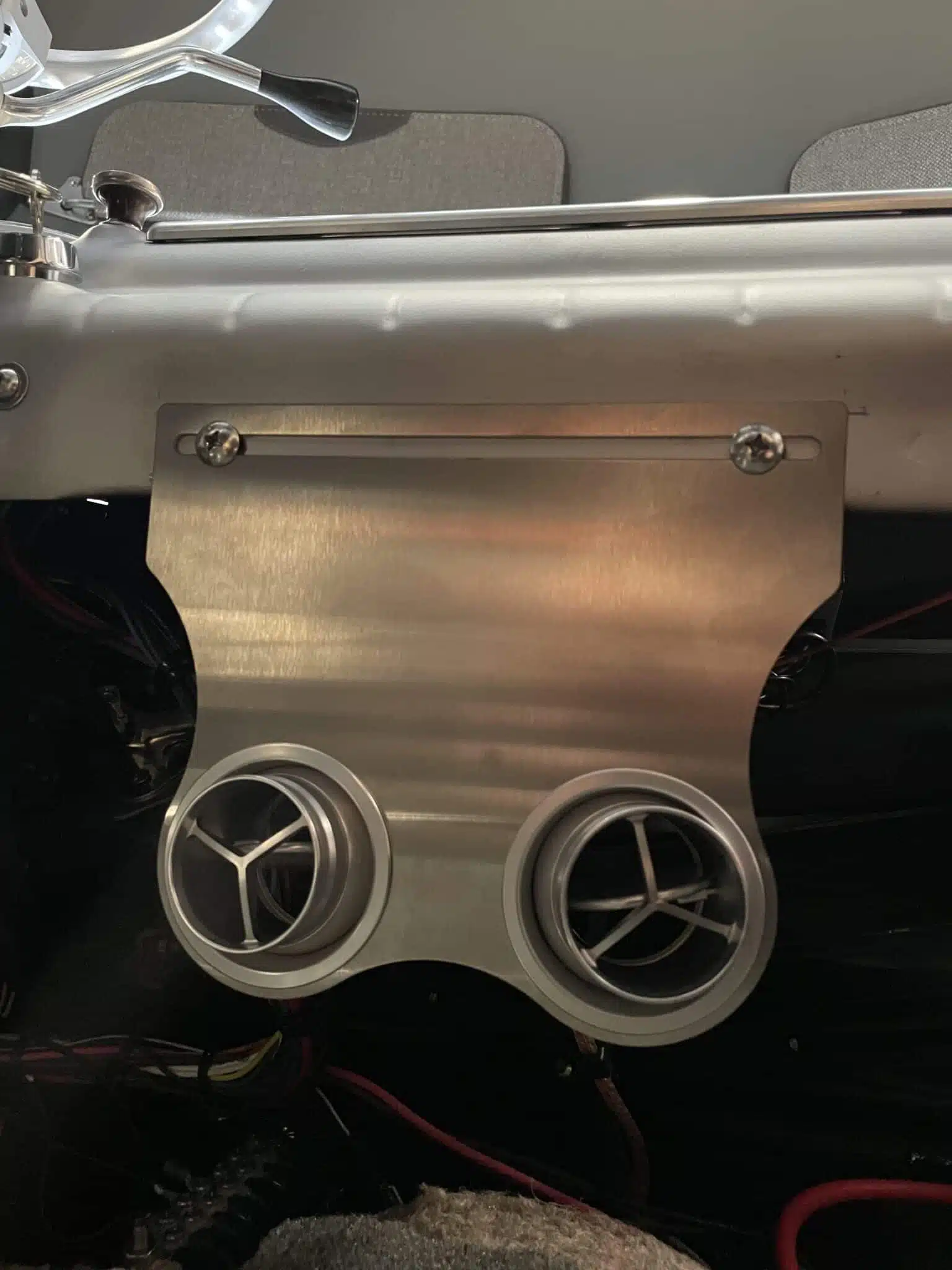 Under dash AC vents installed beneath the dash of a 47-53 Chevy truck