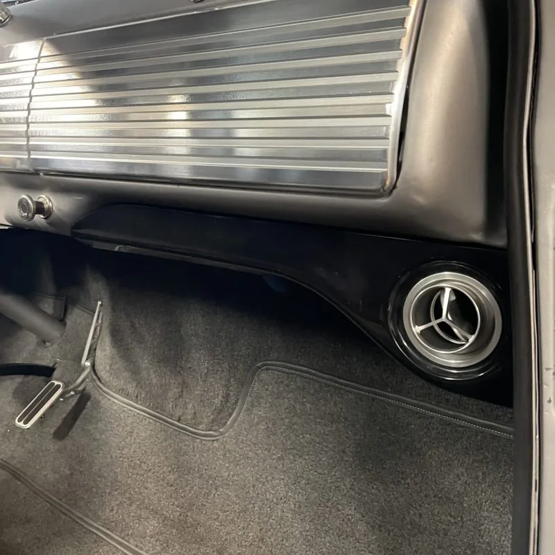 Under dash AC vent brackets installed in a 47-53 GMC Chevy truck