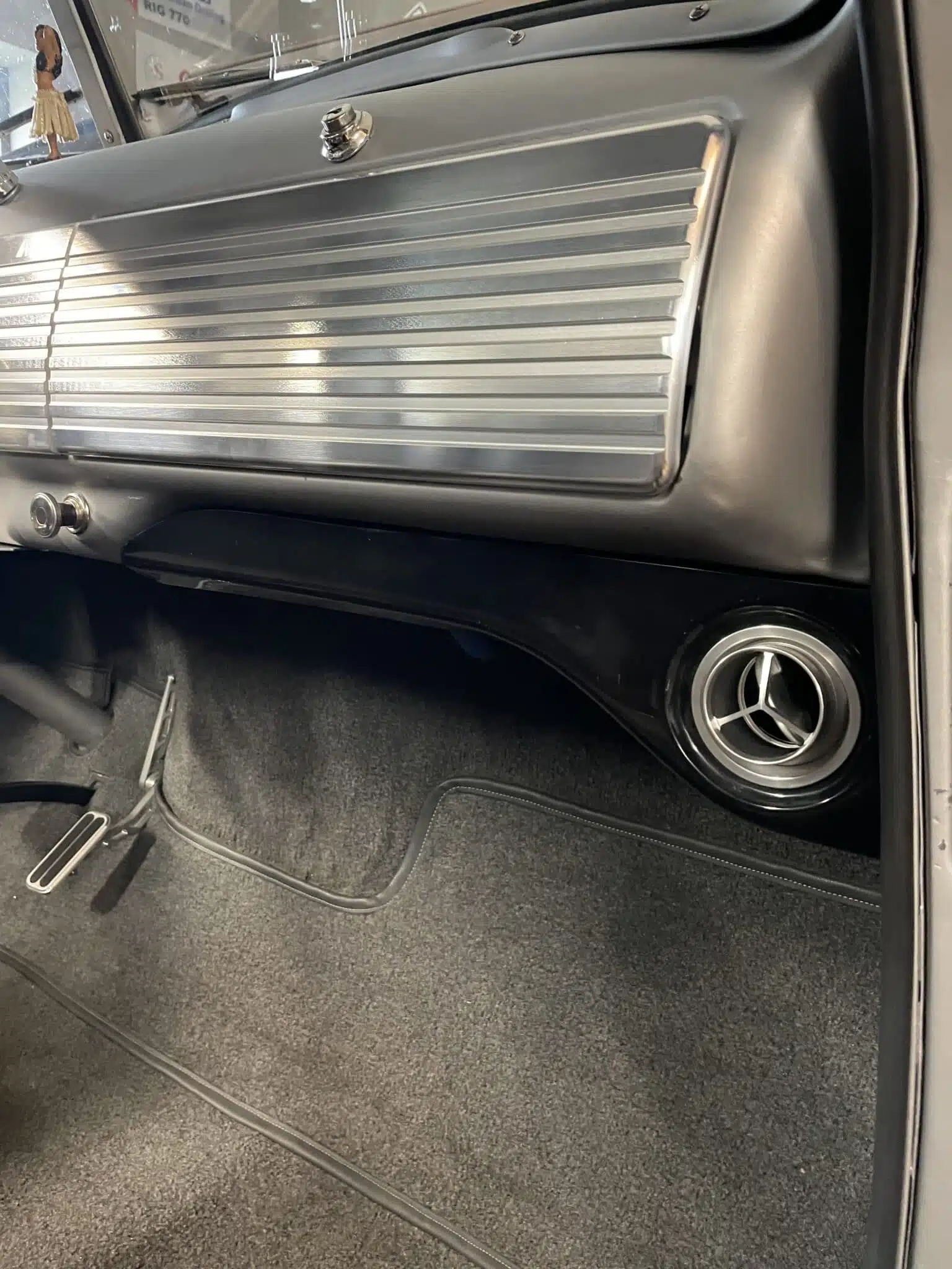Under dash AC vent brackets installed in a 47-53 GMC Chevy truck