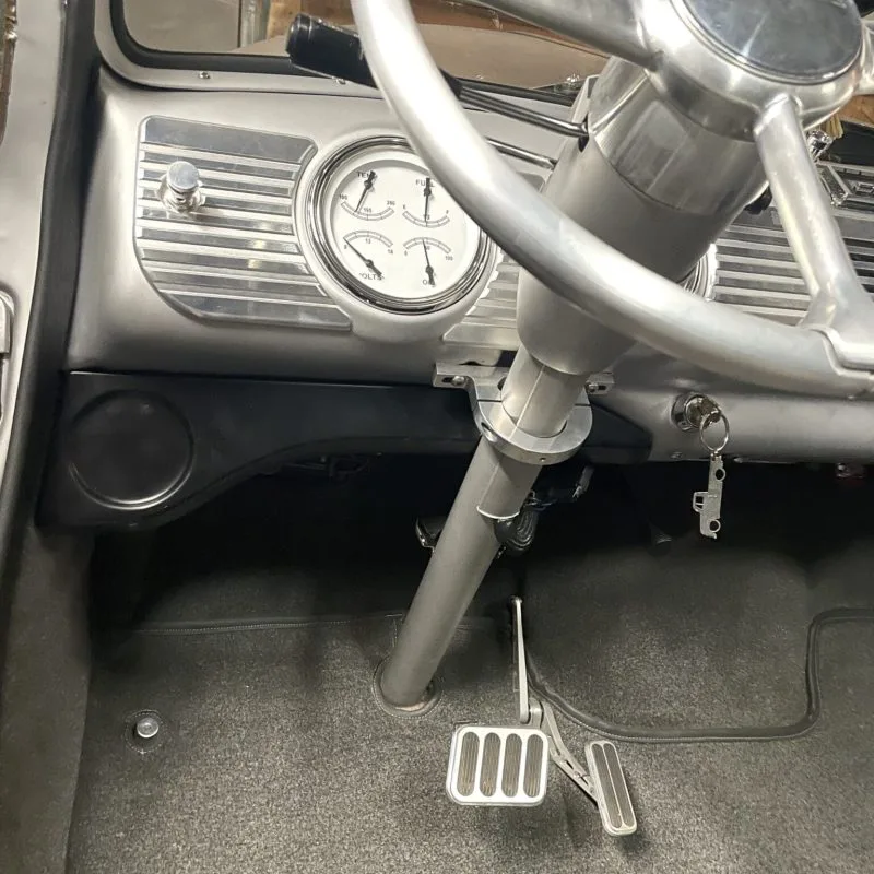 Under dash AC vent brackets in a 47-53 GMC Chevy truck, driver side