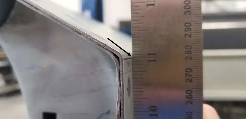Using straight edge ruler to find radius start point on bed side