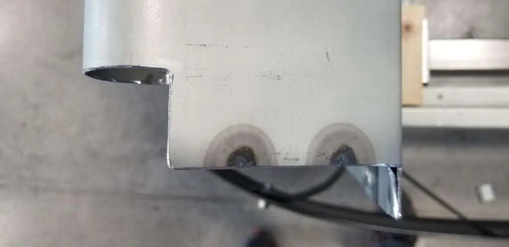 Cutting truck bed side with aluminum oxide cutoff wheel