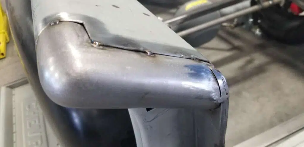 Bed corner tack welded firmly in place