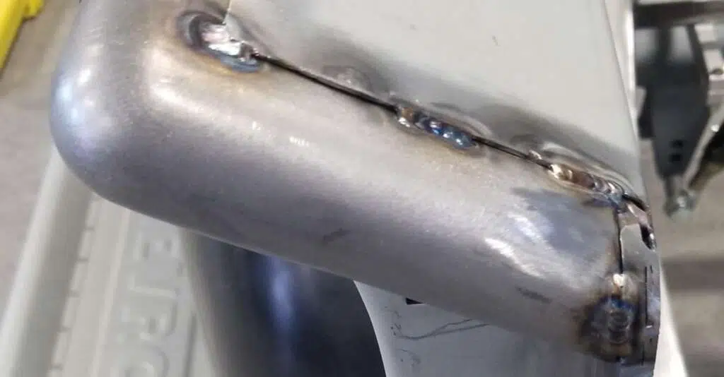 Stitch welding bed corner in small sections