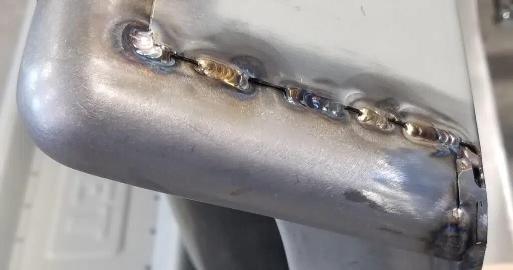 Completed stitch welds on bed corner