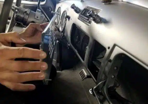 Billet speaker grille installed into original dash holes