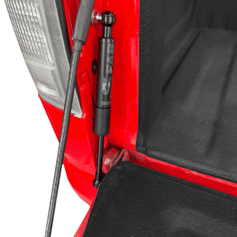 88-98-obs-truck-tailgate-shock-strut-installed 88-98-obs-truck-tailgate-shock-strut-installed