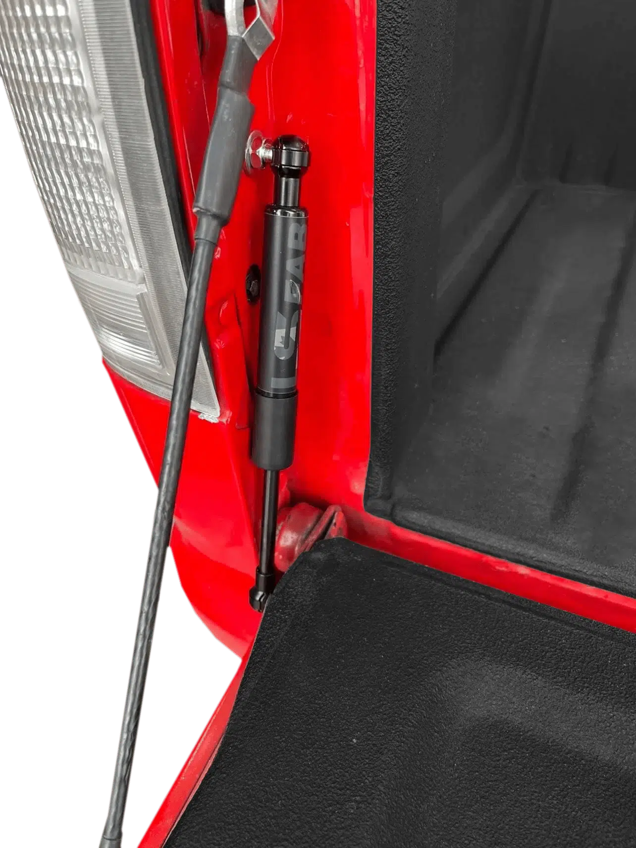 Tailgate saver shock shown installed on an 88-98 GMC Chevy OBS truck