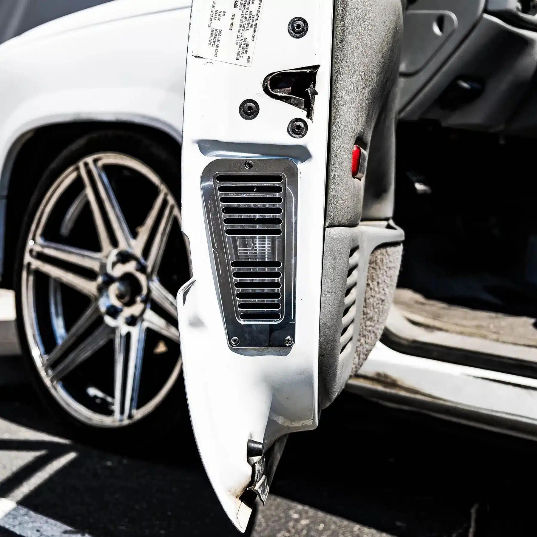Billet door jamb vents machine finished and installed on 1988-98 GM Chevy truck