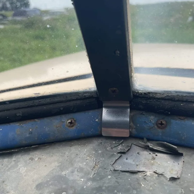 Windshield trim fill piece fitted into the window opening of a 47-53 Chevy truck