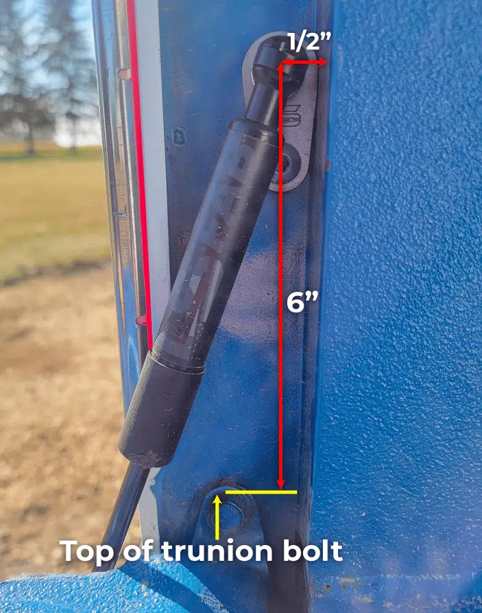 Support bracket hole location on 1981-87 tailgate, measured from trunnion bolt