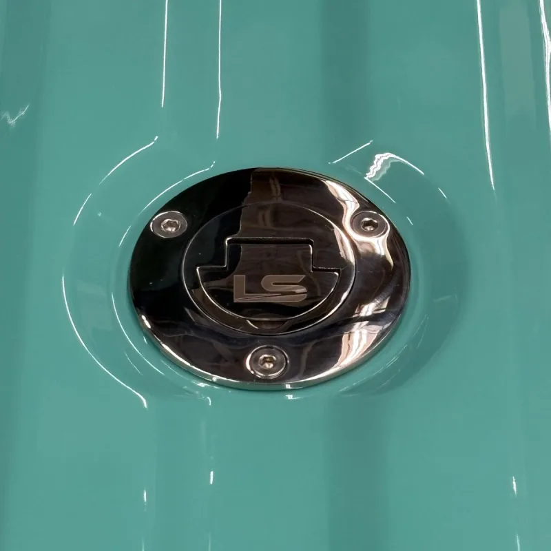 Fuel filler neck fitted to a truck bed panel filler door, alternate angle