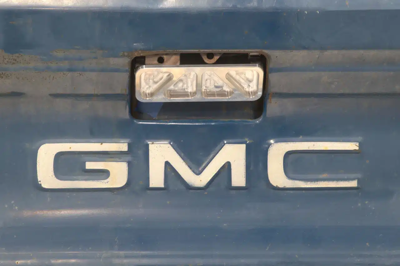 Tailgate release handle shown installed on a 73-80 GMC Chevy truck tailgate