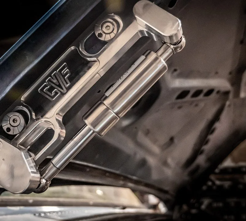 Billet hood hinges shown installed on an 81-87 Chevy GMC C10 truck