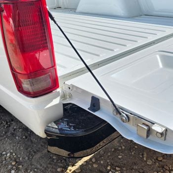 1982-1994-s10-tailgate-cables-chevy-truck-installed-white-truck