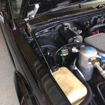 83-93 hood strut kit installed on black chevy truck
