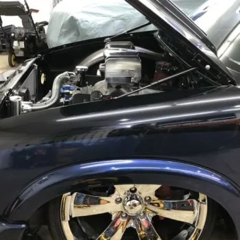 9404 hood strut kit installed on blue chevy truck