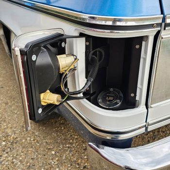 installed chevy taillight fuel filler on a square body truck