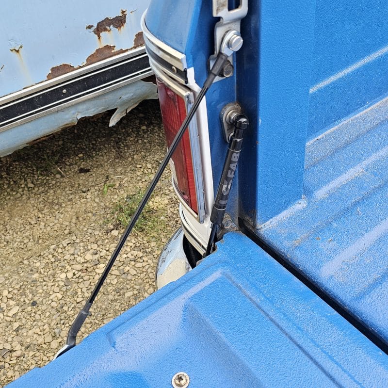 tailgate-saver-for-squarebody-chevy-truck-strut-shock c10 installed 2 Tailgate shock strut and cables for chevy c10 truck