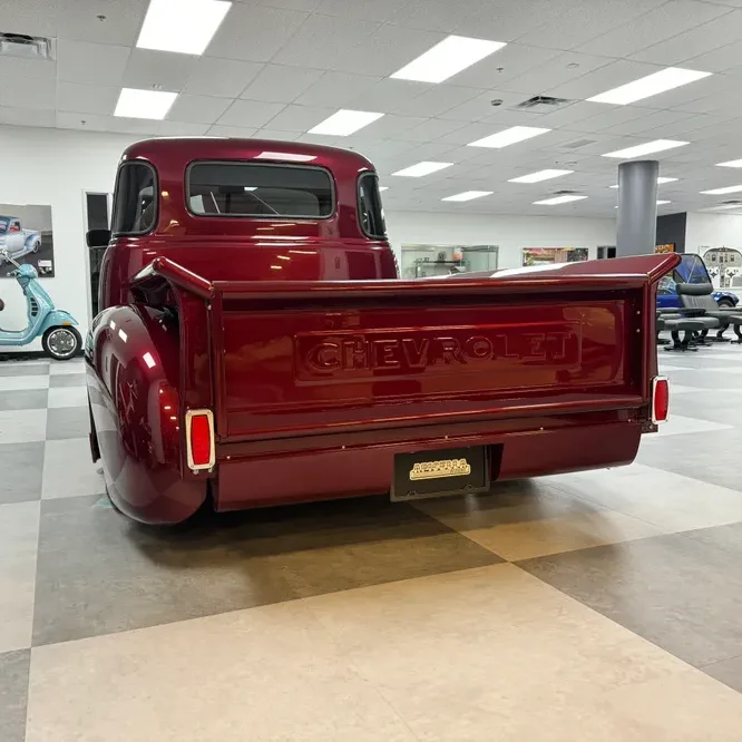 Billet trunnion and taillight combo for 47-53 GMC Chevy truck, close-up detail