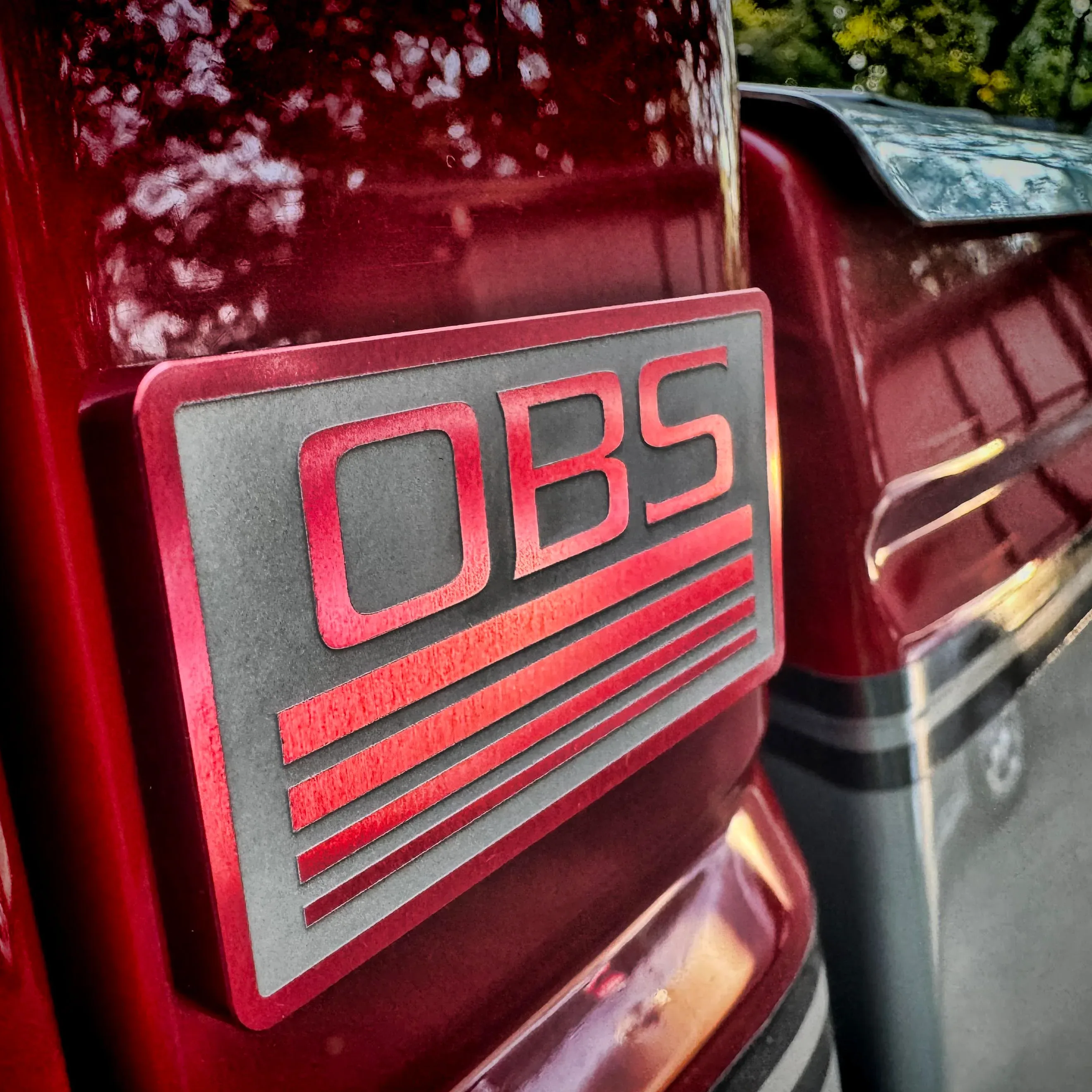 Billet pillar emblems shown installed on an 88-98 Chevy OBS truck
