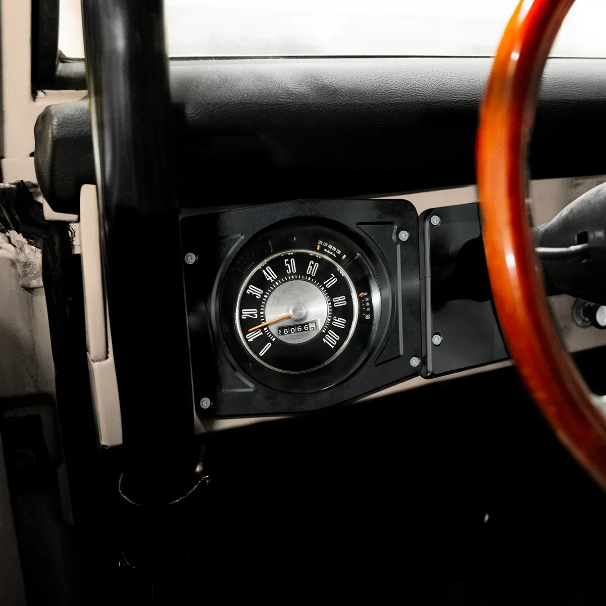 Black anodized instrument gauge bezel for 1966-1977 Ford Bronco dash