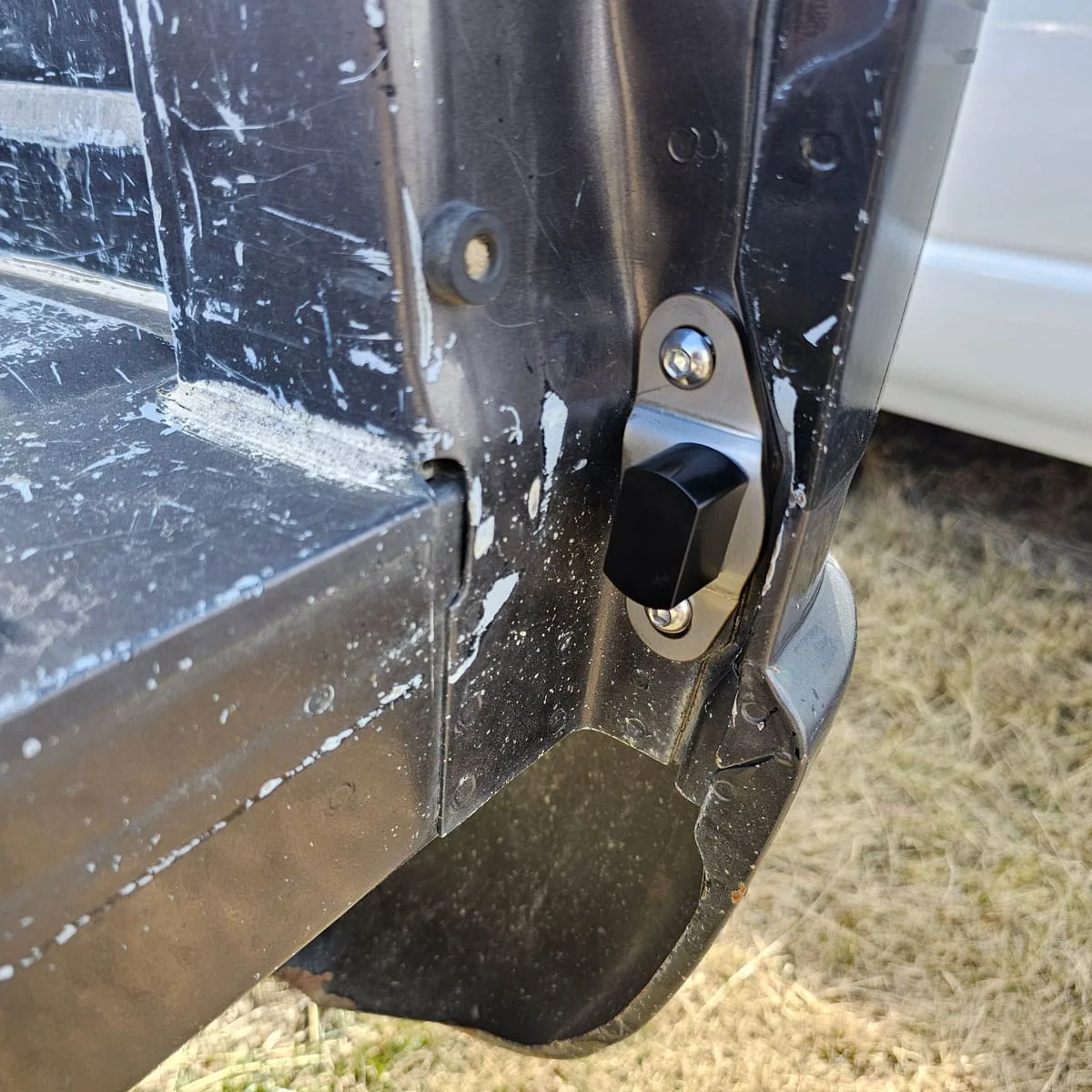 Tailgate trunnions shown installed on an 88-98 GMC Chevy OBS truck