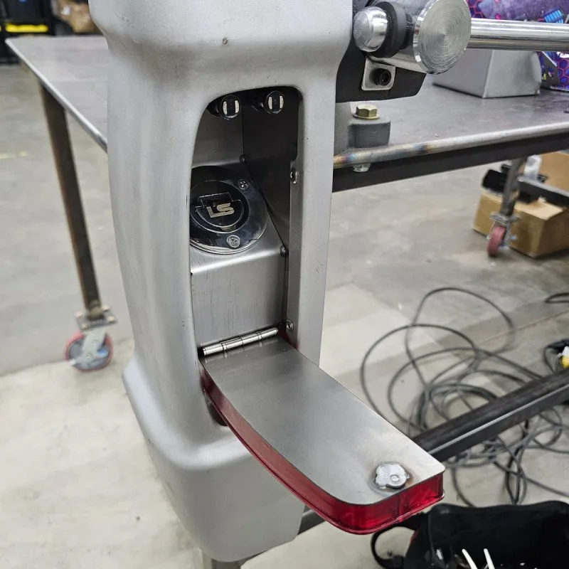 Ford taillight fuel filler bucket installed behind the taillight of a 1967-72 F100 bedside