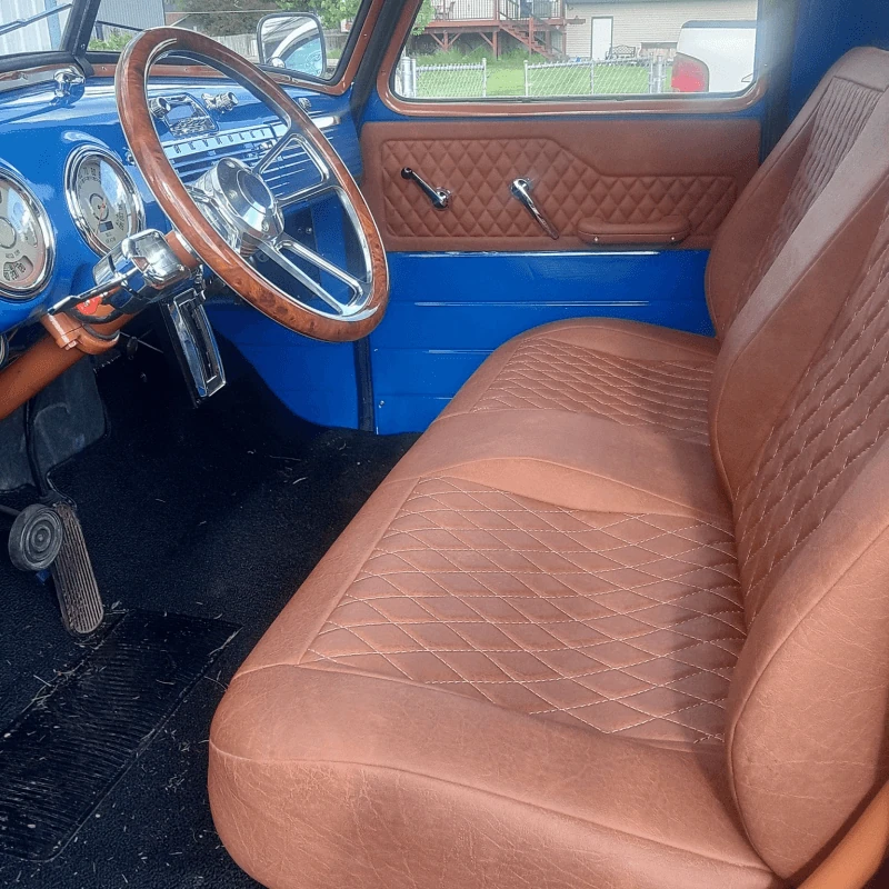 Vinyl interior kit shown installed in a 3100 GM truck cab, passenger side