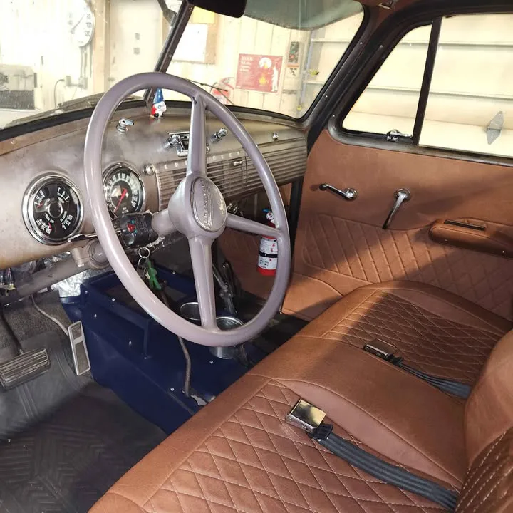 Vinyl interior kit shown installed in a 3100 GM truck cab