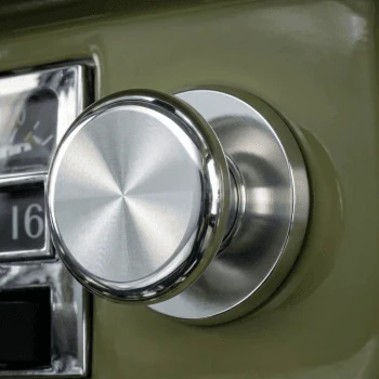 Billet dash knob shown mounted on a classic truck dash panel